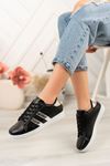 Black Sneakers with Silver Stripes