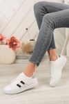 White Sneakers with Silver Stripes