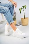 White Sneakers with Green Garnish